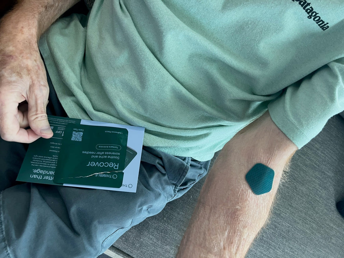 Man wearing Thimble Recover patch after blood draw